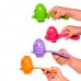 Tomy Развивающая игрушка Яркие яйца с ложечками, T73082